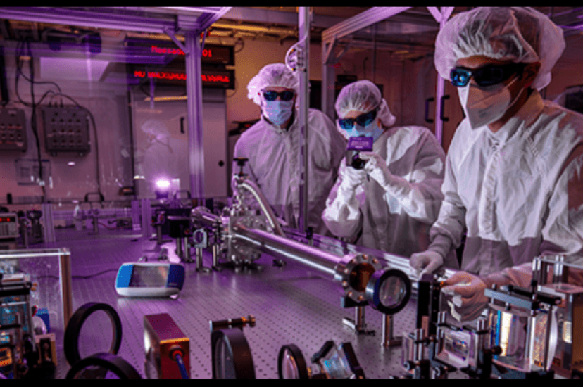 Researchers work on a prototype laser system, developed as part of the project (Image: Lawrence Livermore National Laboratory)