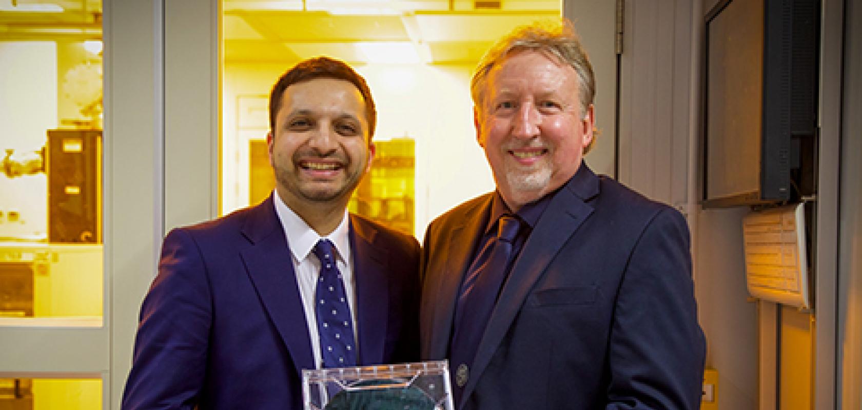 Saqib Bhatti, the UK's Minister for Tech and the Digital Economy, left, and Professor Graham Reed, director of the Optoelectronics Research Centre at the University of Southampton