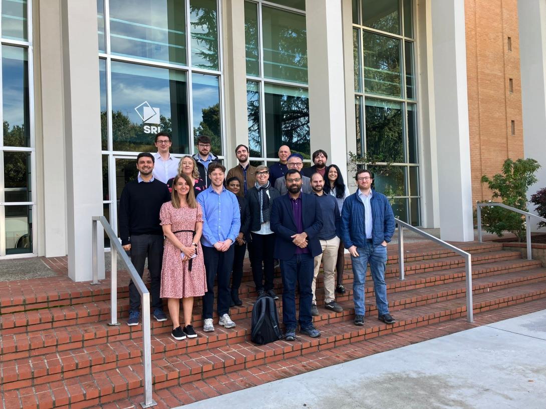 A group of people standing outside a building